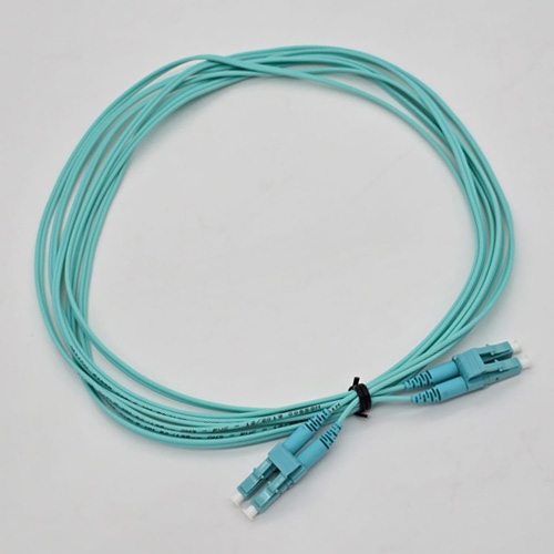 FTT Patch Cord LC-UPC-LC-UPC,MM OM3 PVC DX 3m 2mm Cyan2 FTT Patch Cord LC-UPC-LC-UPC,MM OM3 PVC DX 3m 2mm Cyan - Image 1